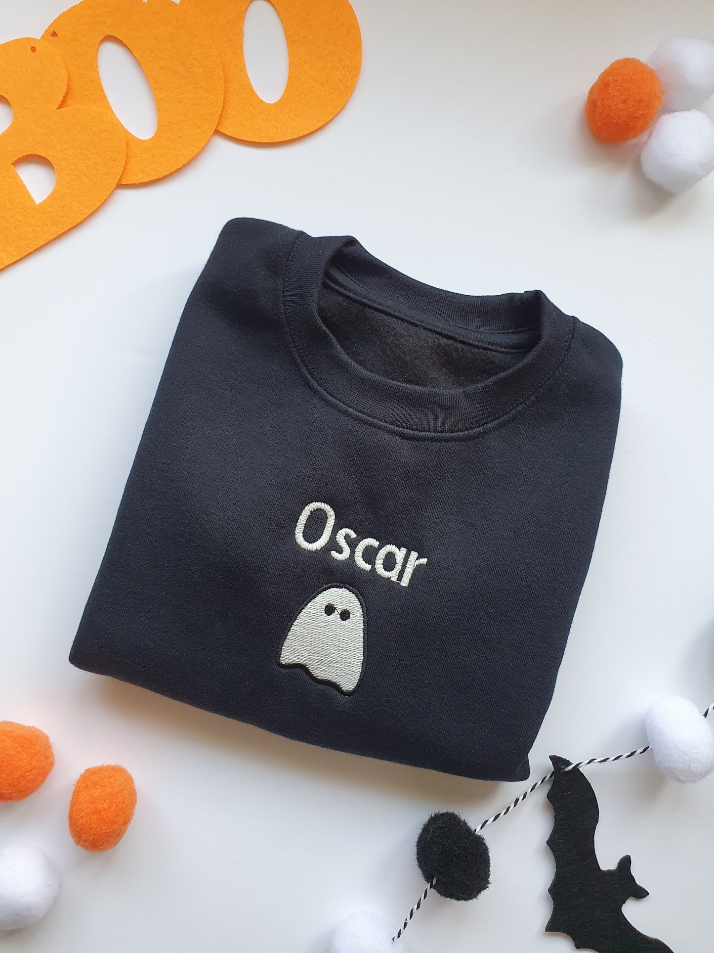 Glow in the dark embroidered halloween ghost jumper personalised with childs name