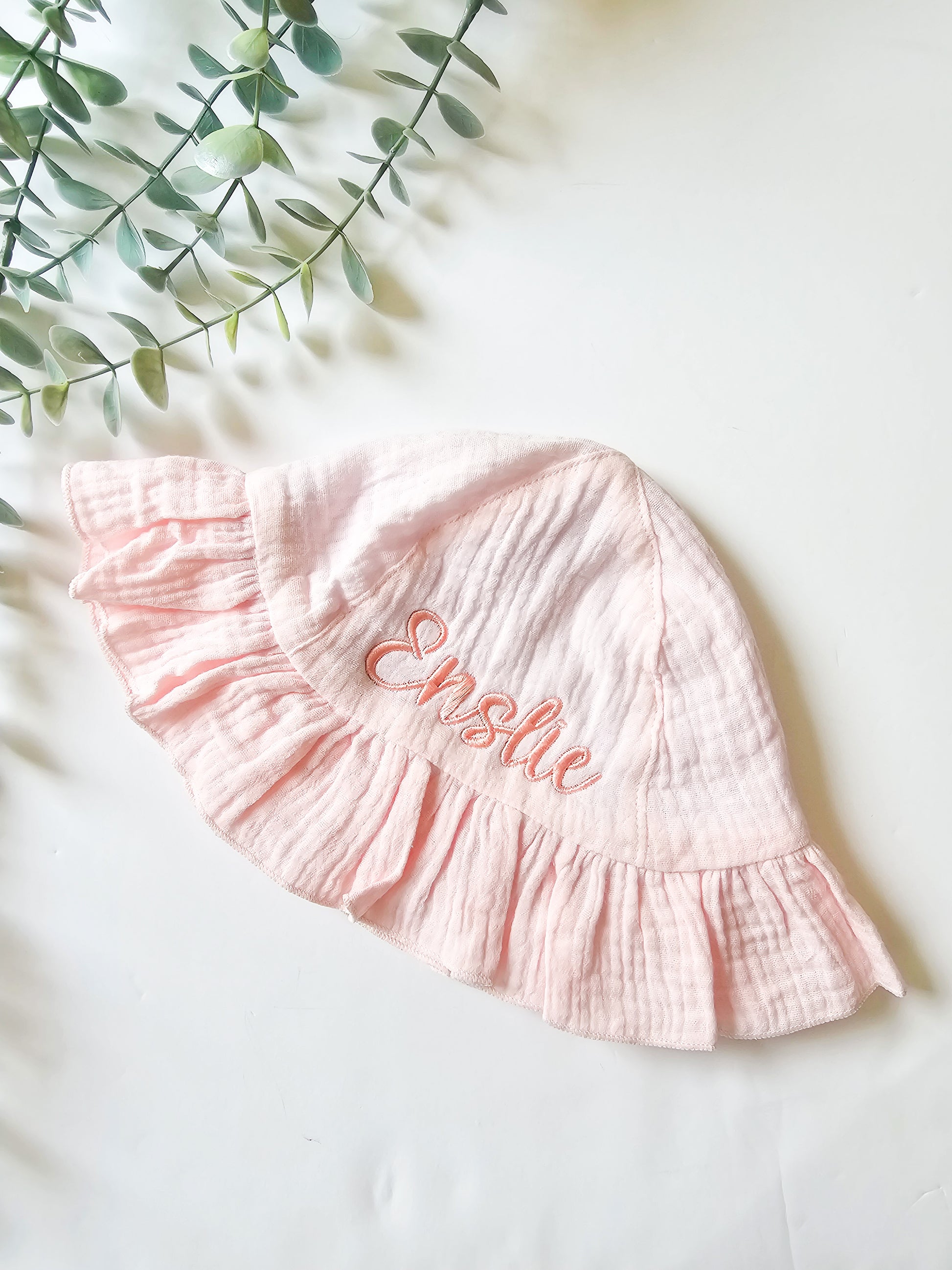 Pink baby sun hat, personalised embroidered in matching pink thread.