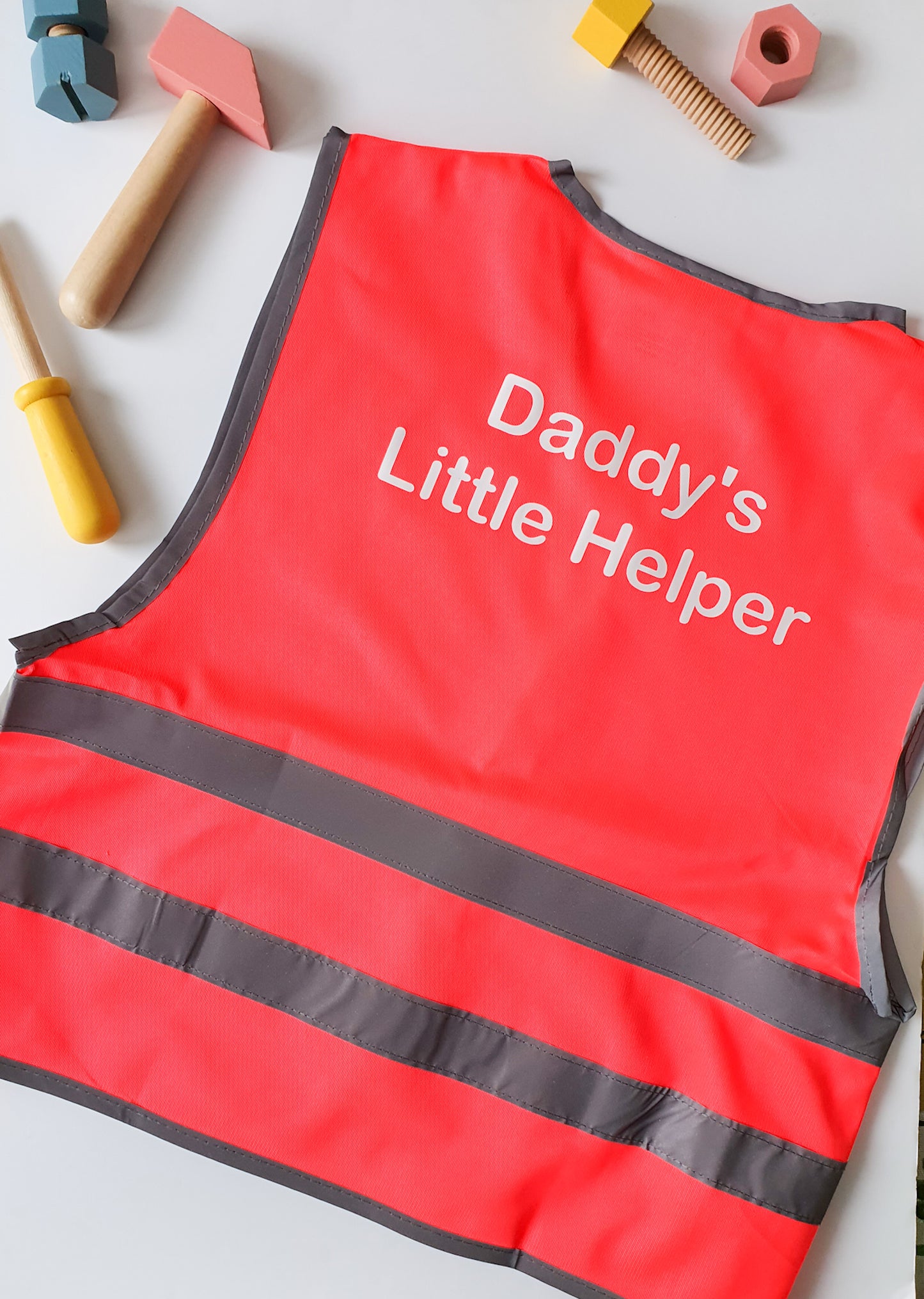 Pink childrens Hi-Vis role play vest printed daddys little helper on the back