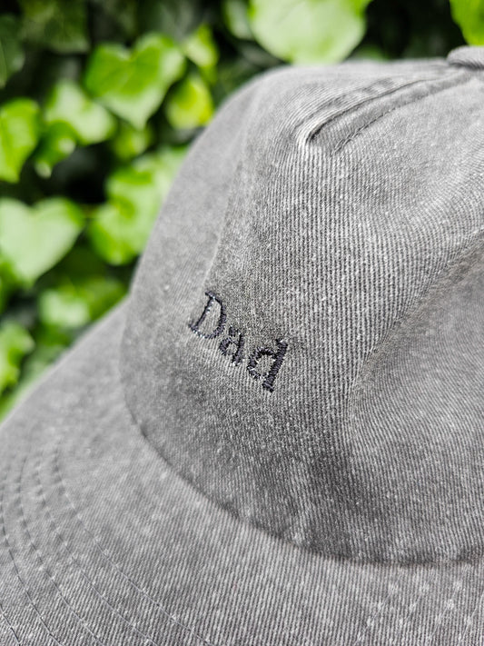 Close up of embroidered dad vintage style cap