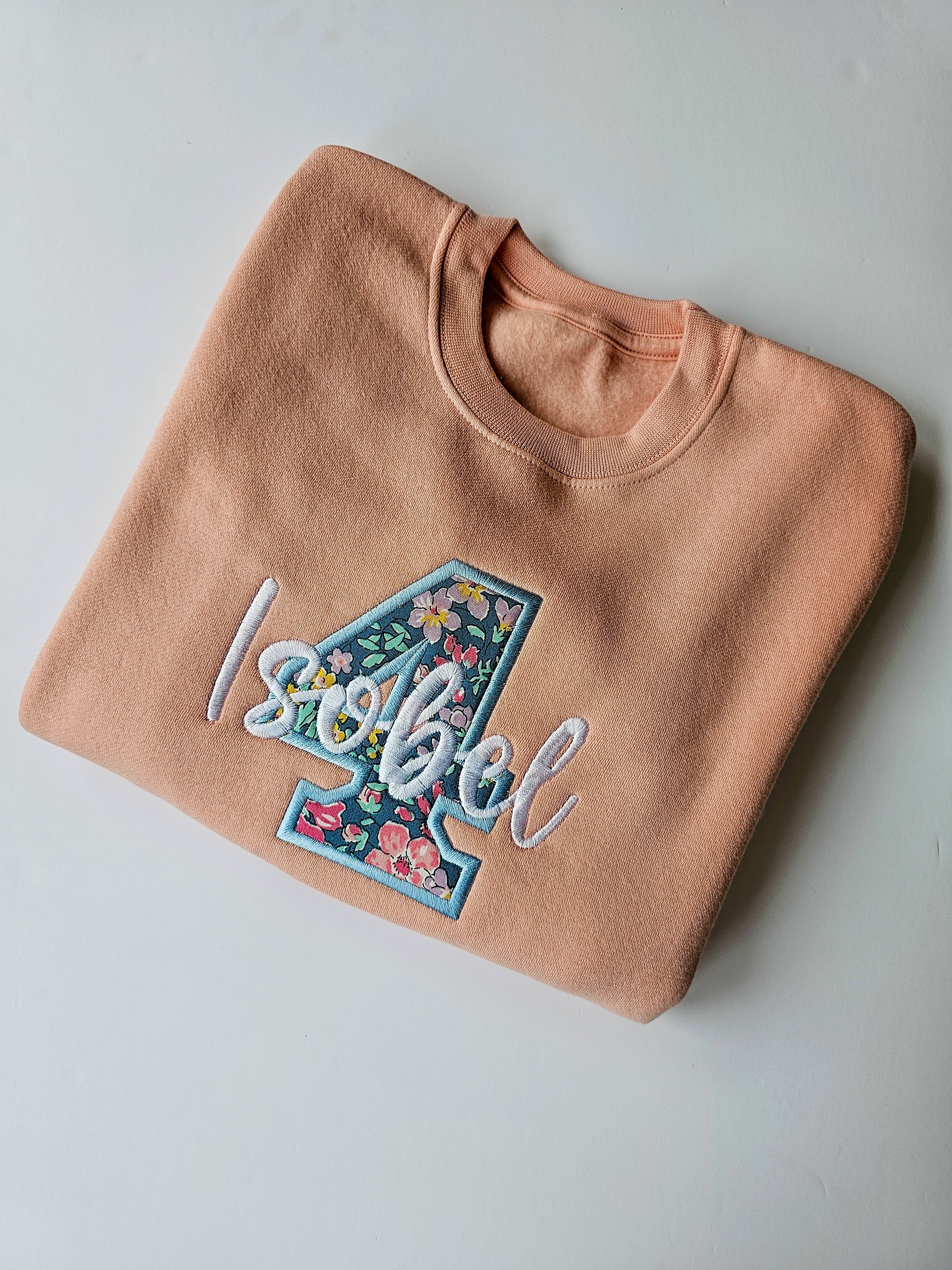 Peach personalised birthday jumper, embroidered liberty print 4 and childs name across the middle