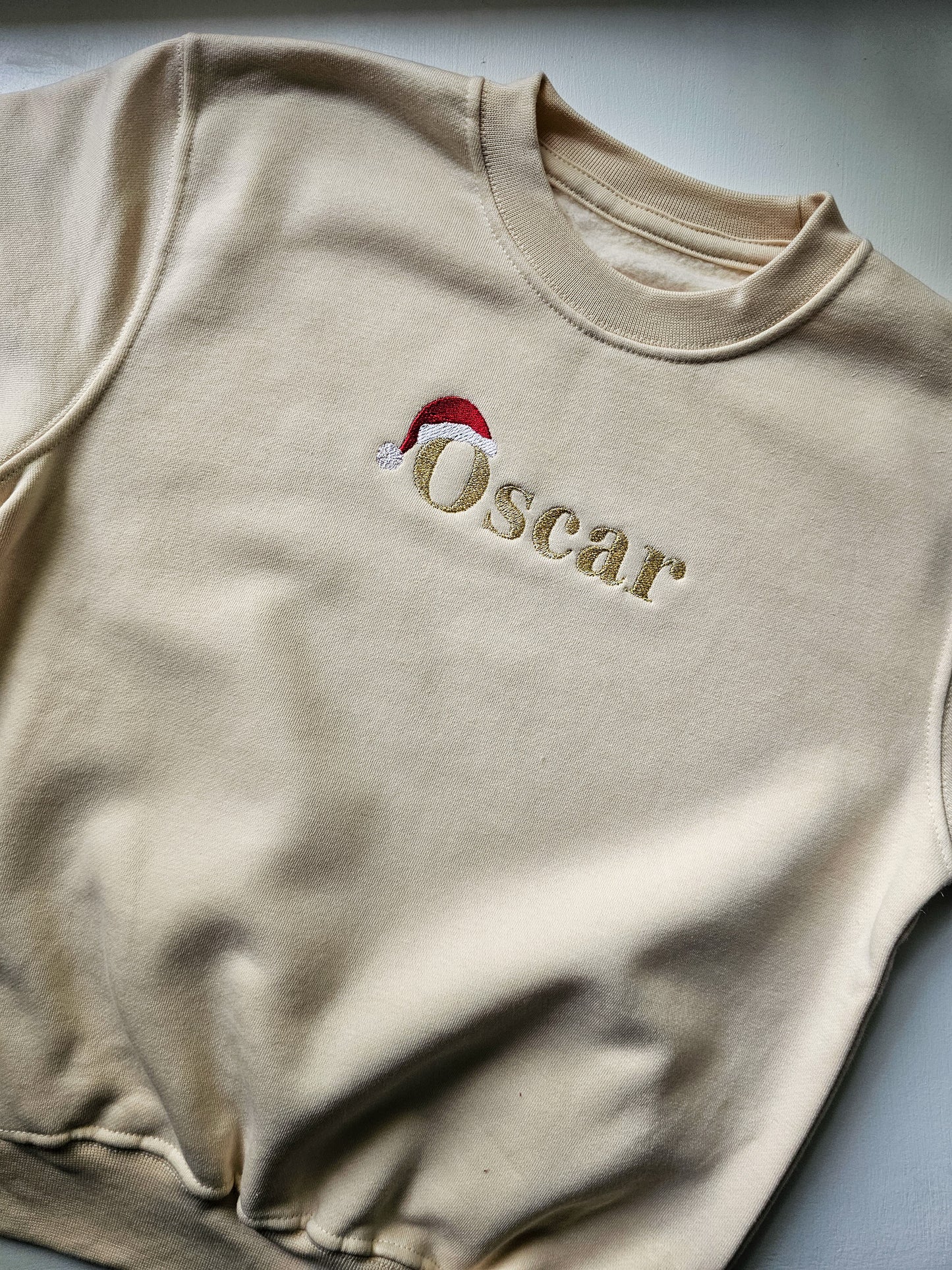 Personalised Children’s Christmas Jumper | Embroidered Name with Santa Hat | Custom Festive Jumper UK