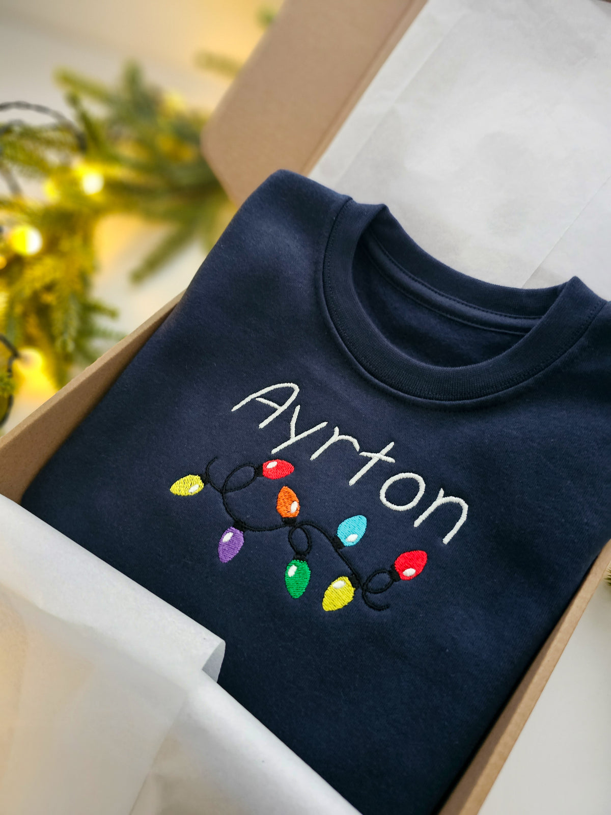 Personalised Children’s Christmas Jumper | Embroidered Name & Christmas Lights | Custom Festive Gift UK